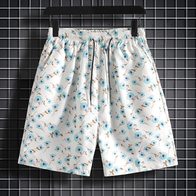 Hawaiian casual shorts men's Hong Kong style loose Hainan Island flower shorts beach vacation trendy shorts one-piece delivery