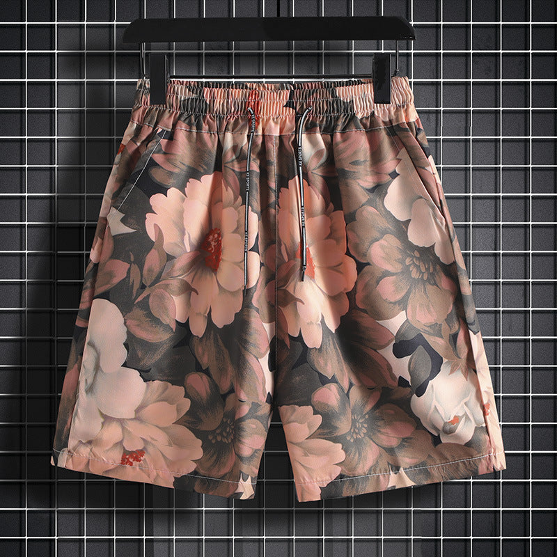 Hawaiian casual shorts men's Hong Kong style loose Hainan Island flower shorts beach vacation trendy shorts one-piece delivery