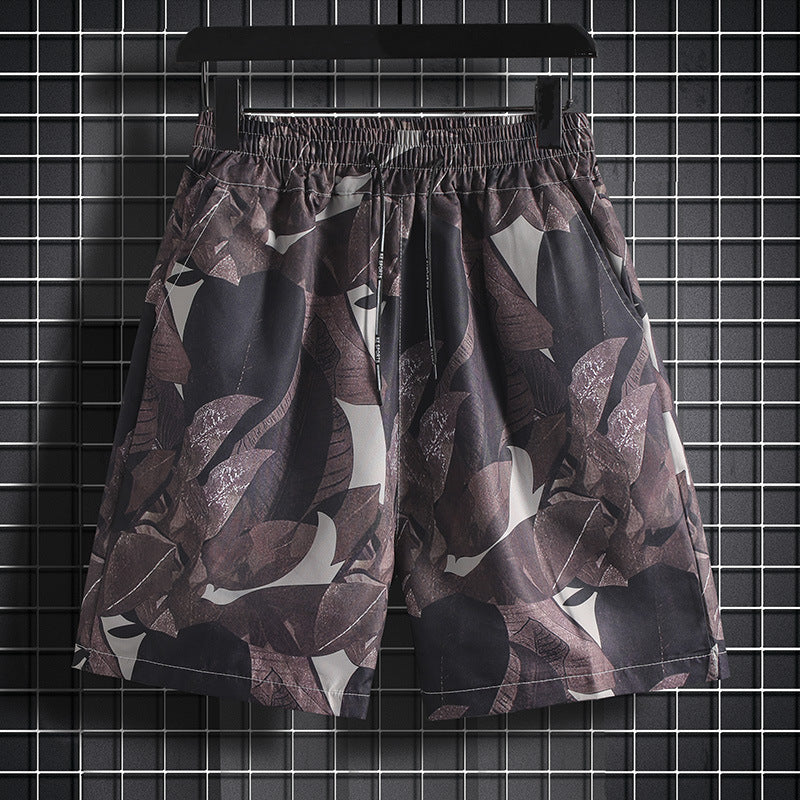 Hawaiian casual shorts men's Hong Kong style loose Hainan Island flower shorts beach vacation trendy shorts one-piece delivery