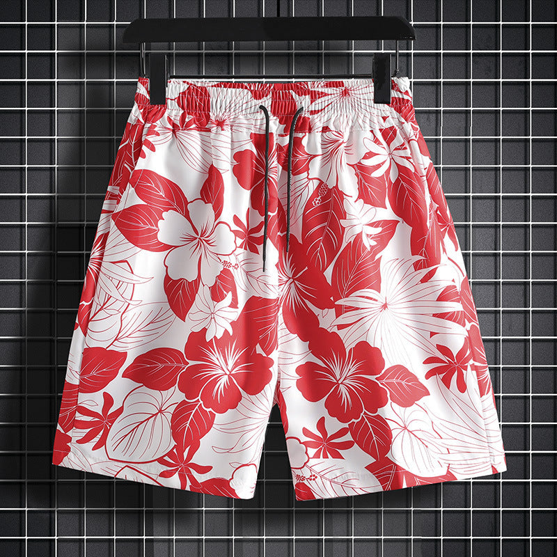 Hawaiian casual shorts men's Hong Kong style loose Hainan Island flower shorts beach vacation trendy shorts one-piece delivery