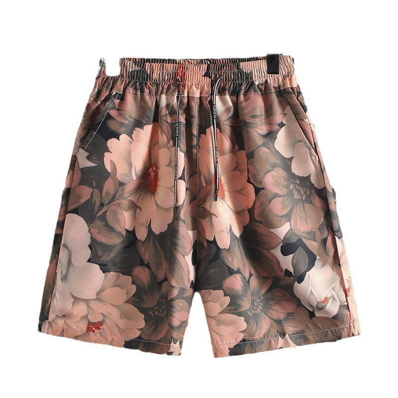 Hawaiian casual shorts men's Hong Kong style loose Hainan Island flower shorts beach vacation trendy shorts one-piece delivery